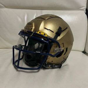 Gold Football Helmet with Blue Accents Men’s Medium